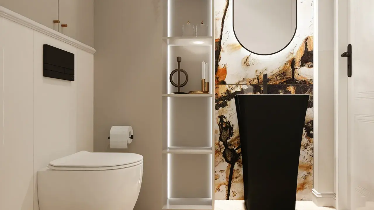 Nowoczesna, mała wąska toaleta z białym WC, czarną umywalką wolnostojącą i ozdobną ścianą.