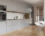 Nowoczesne meble kuchenne wymiary: szare fronty, drewniane akcenty, wbudowane piekarniki i lodówka.