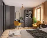 Nowoczesna sypialnia z szarą garderobą, żółtym fotelem i toaletką. Inspiracja, jak urządzić sypialnię w eleganckim stylu.