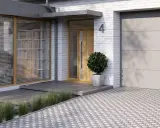 Nowoczesny wiatrołap zewnętrzny inspiracje: drewniane drzwi, betonowe schody i ozdobna trawa. Eleganckie wejście do domu.
