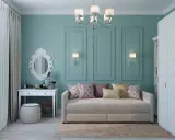 Elegancka toaletka z lustrem i kosmetykami, obok wygodna sofa. Idealne miejsce, by połączyć biurko z toaletką w stylowy sposób.
